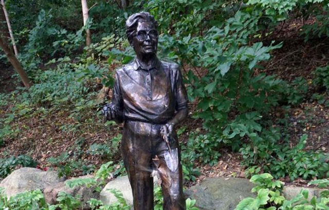 Marie Aull statue in a garden