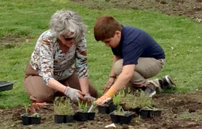 member and student planting